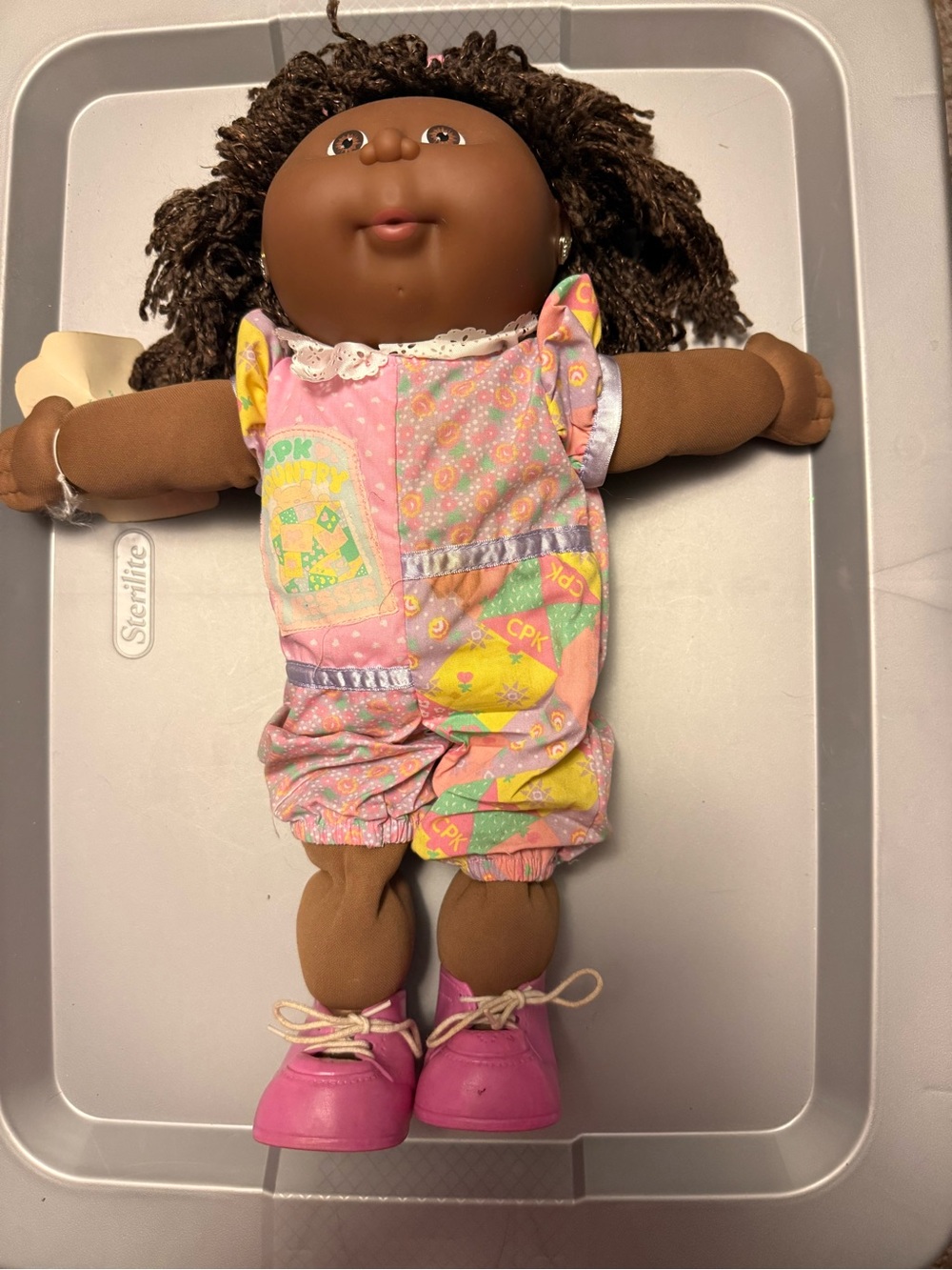 Free Kisses Brown Doll in Pink Patterned Romper with Pink Shoes